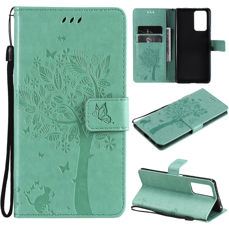 Green PU leather phone wallet case with cat-and-tree pattern, card slots, stand, strap