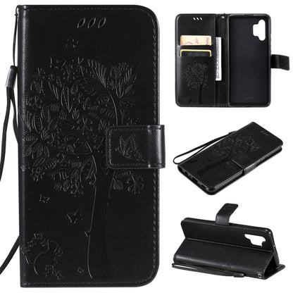 Black PU leather phone wallet case with embossed cat-and-tree pattern, card slots