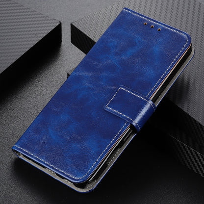 Blue leather flip phone case with card slots, angled view on a dark surface
