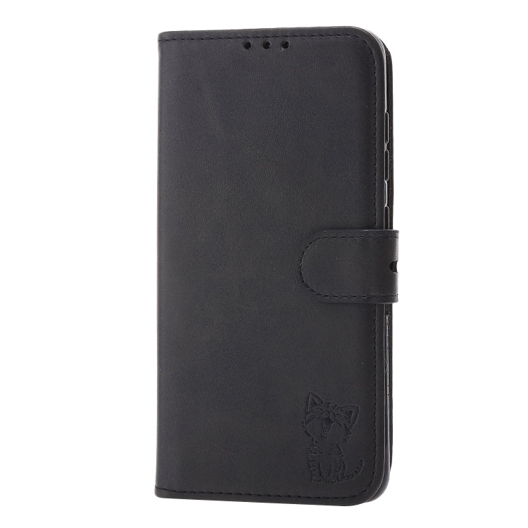 Black folio leather phone case with embossed cat and side snap strap