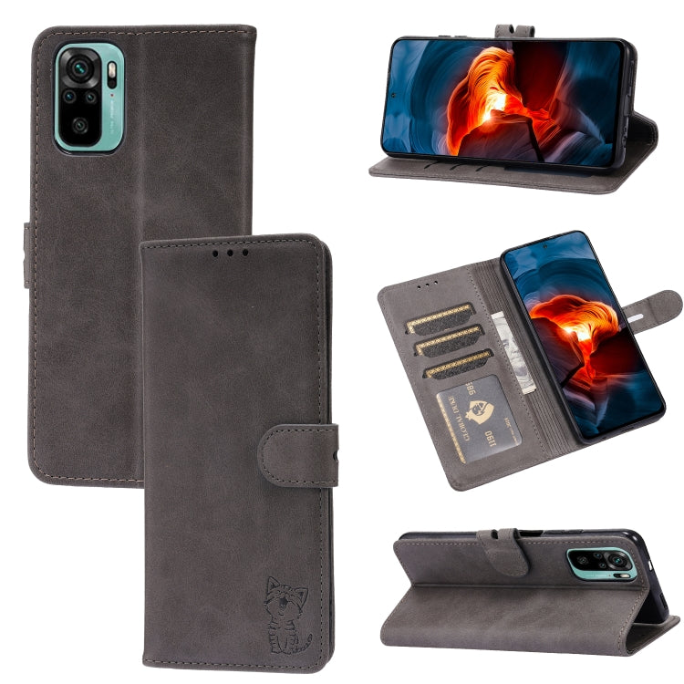 Grey flip leather phone case with embossed cat, card slots, and wallet stand
