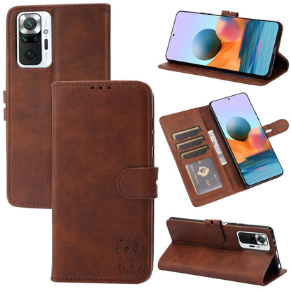 Tan leather flip phone wallet case with embossed cat, card slots, and stand holder