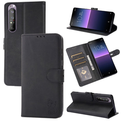 Black leather flip phone wallet case with embossed cat, holder, and card slots