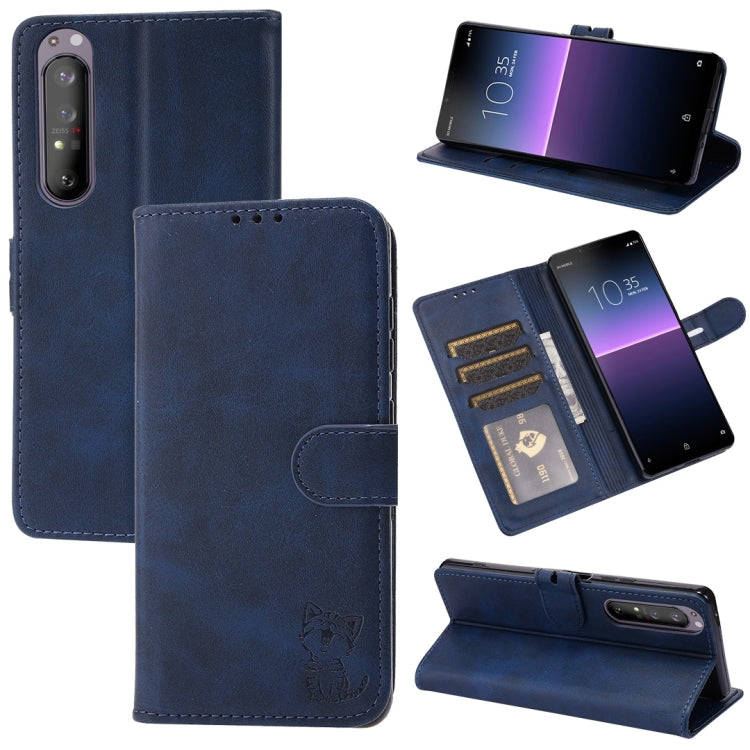Blue leather flip phone wallet case with embossed cat, holder, and card slots