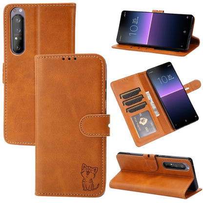 Brown leather flip phone wallet case with embossed cat, holder, and card slots