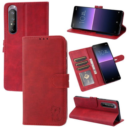 Red leather flip phone wallet case with embossed cat, holder, and card slots