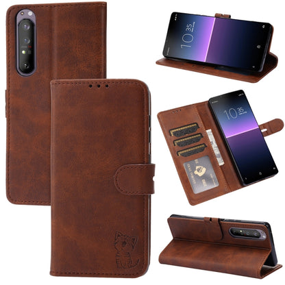 Brown leather flip phone case with embossed cat, card slots, and fold stand