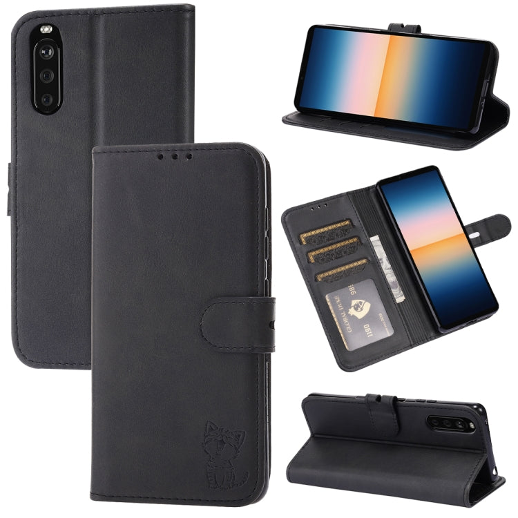 Black leather flip phone case with embossed cat, card slots, and fold stand