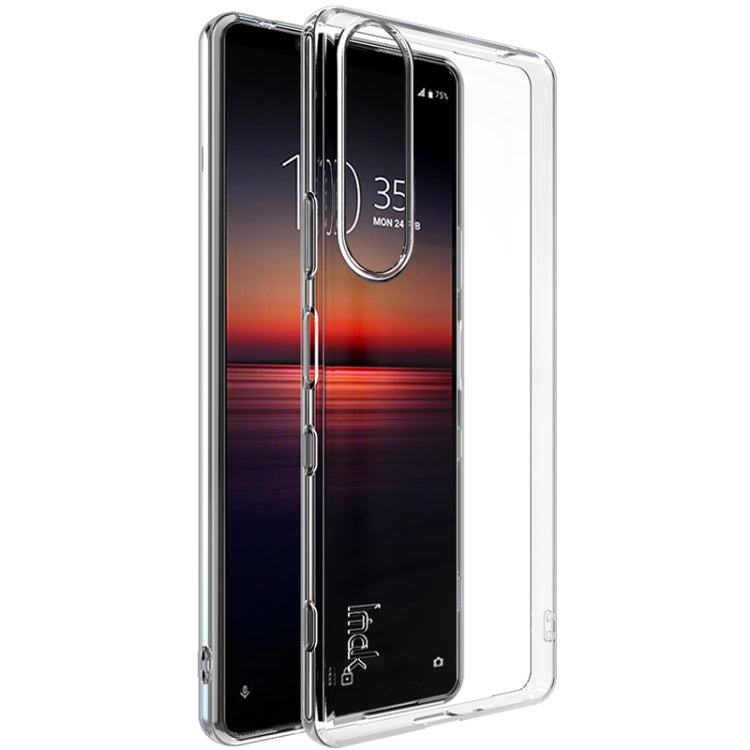 Transparent shockproof TPU phone case with raised edges and camera cutout