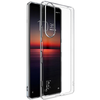 Transparent shockproof TPU phone case with raised edges and camera cutout