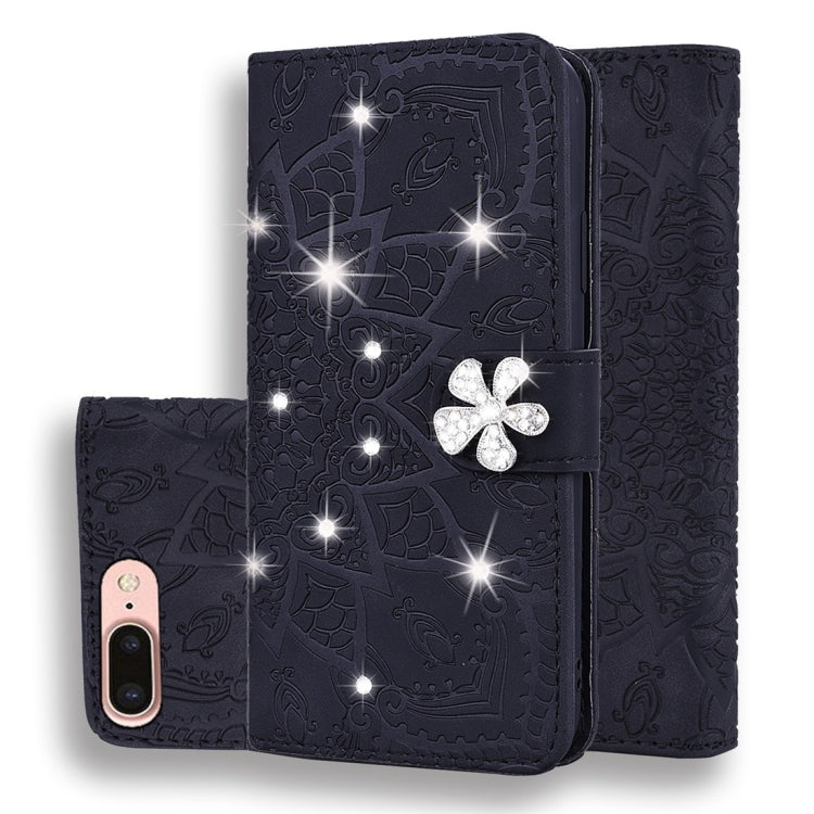 Black embossed mandala wallet phone case with double fold and crystal flower clasp