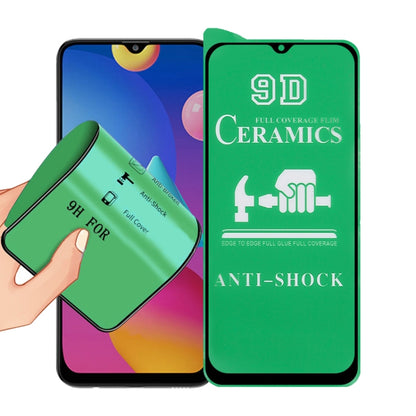 9D ceramics full-glue screen protector film with green anti-shock design, held near phone