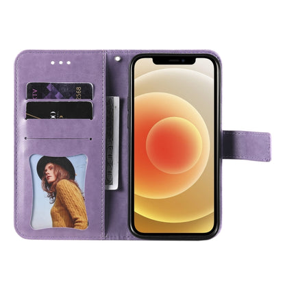 Purple flip phone wallet with photo window, card slots, and front cover over phone