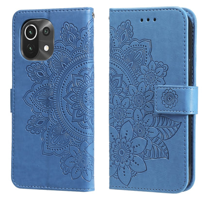 Blue PU leather flip phone case with embossed floral pattern, camera cutout, card-slot flap