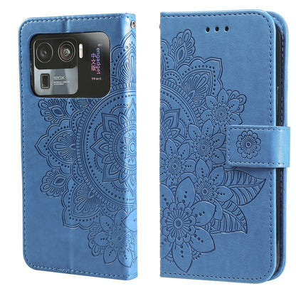 Blue PU leather flip phone case with embossed floral pattern, camera cutout, card-slot flap