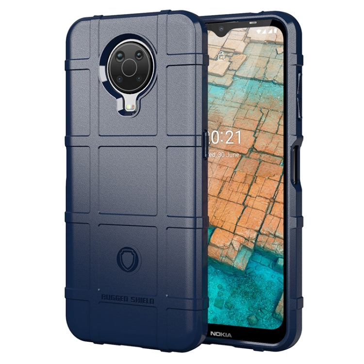 Rugged shockproof TPU phone case in dark blue with grip texture and camera opening