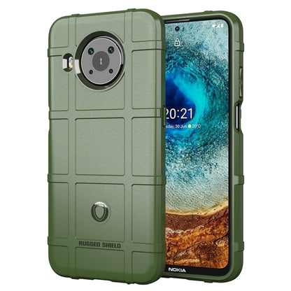 Rugged shockproof TPU phone case in green with textured grip and camera opening