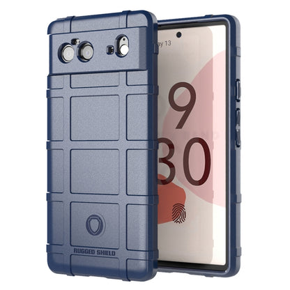 Shockproof TPU phone case with rugged shield pattern, blue, camera cutouts