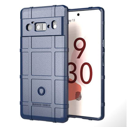 Shockproof TPU phone case with rugged shield pattern, blue, raised edges