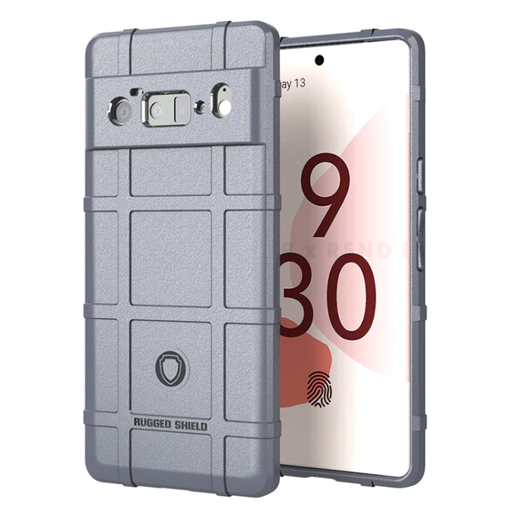 Shockproof TPU phone case with rugged shield pattern, grey, raised edges