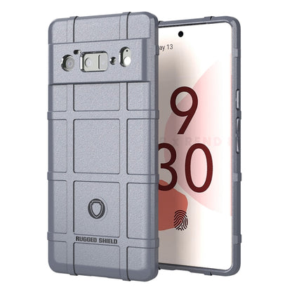 Shockproof TPU phone case with rugged shield pattern, grey, raised edges