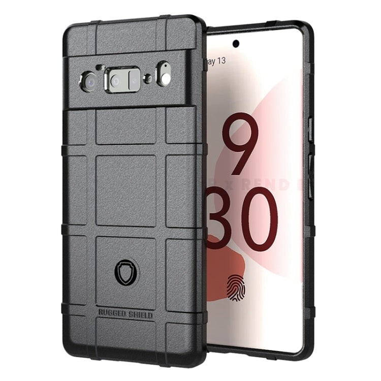 Shockproof TPU phone case with rugged shield pattern, black, raised edges