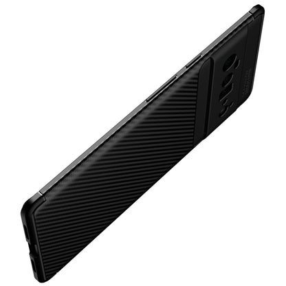 Black carbon fiber texture TPU phone case side profile with button covers.