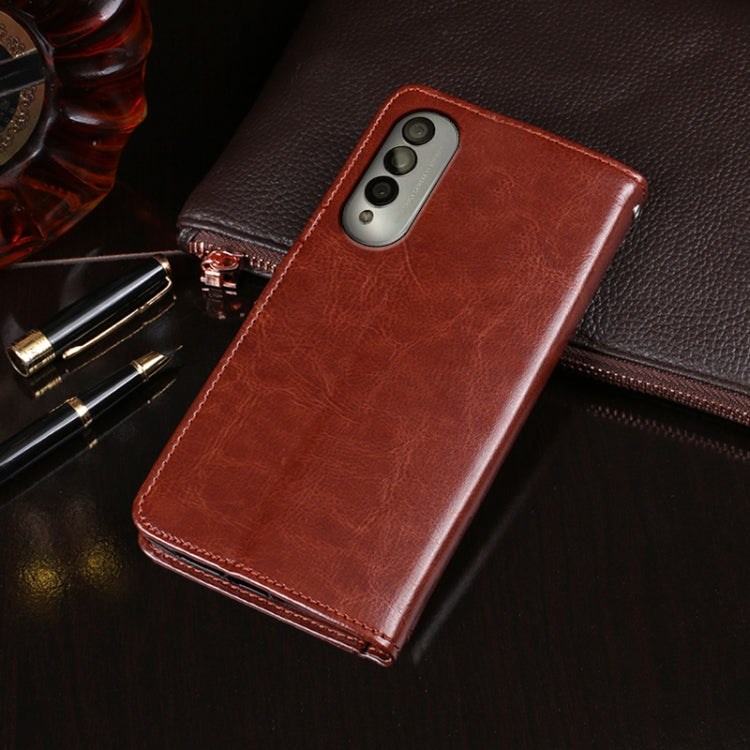 Brown leather flip wallet case with stitched edges and camera cutout