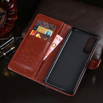 Brown leather flip wallet case with card slots and phone sleeve