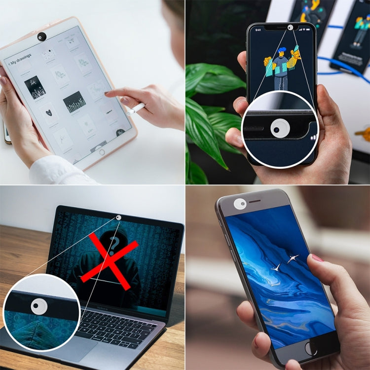 Round webcam covers attached to phone and laptop camera lenses.