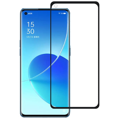 Full glue tempered glass screen protector aligned on smartphone front screen