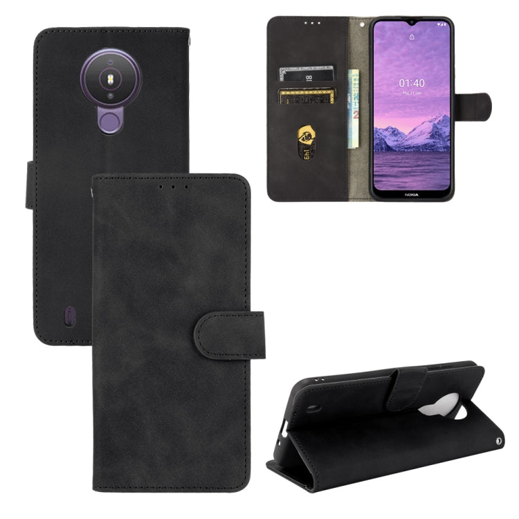 Black PU leather flip phone case with magnetic buckle, card slots, and camera cutout