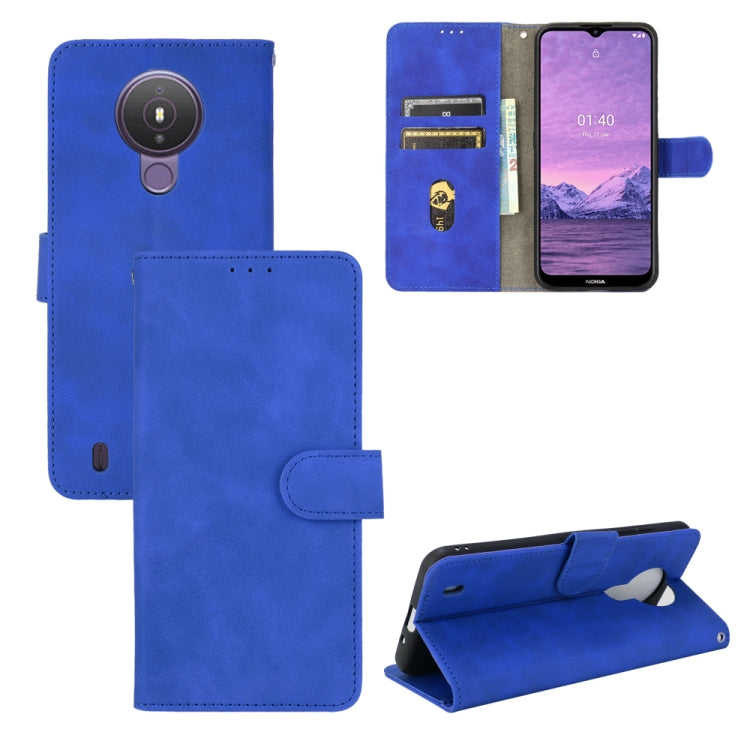 Blue PU leather flip phone case with magnetic buckle, card slots, and camera cutout