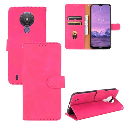 Pink PU leather flip phone case with magnetic buckle, card slots, and camera cutout