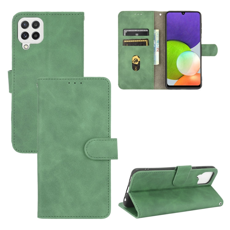 Green horizontal flip wallet phone case with magnetic buckle and card slots