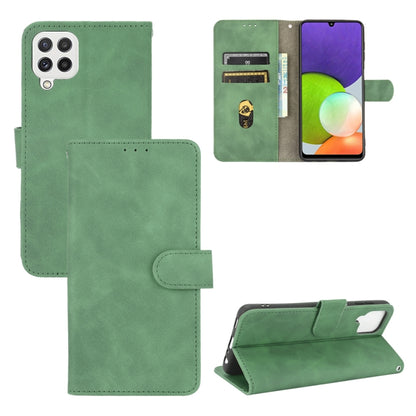 Green horizontal flip wallet phone case with magnetic buckle and card slots