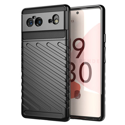 Black TPU shockproof phone case with textured grip and camera cutouts.