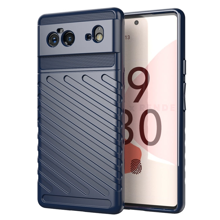 Blue TPU shockproof phone case with textured grip and camera cutouts.