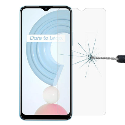 Tempered glass screen protector film for smartphone showing cracked impact pattern