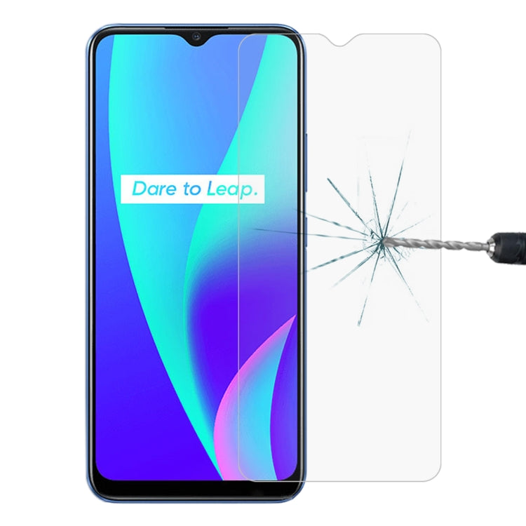 Clear tempered glass screen protector film applied to smartphone screen