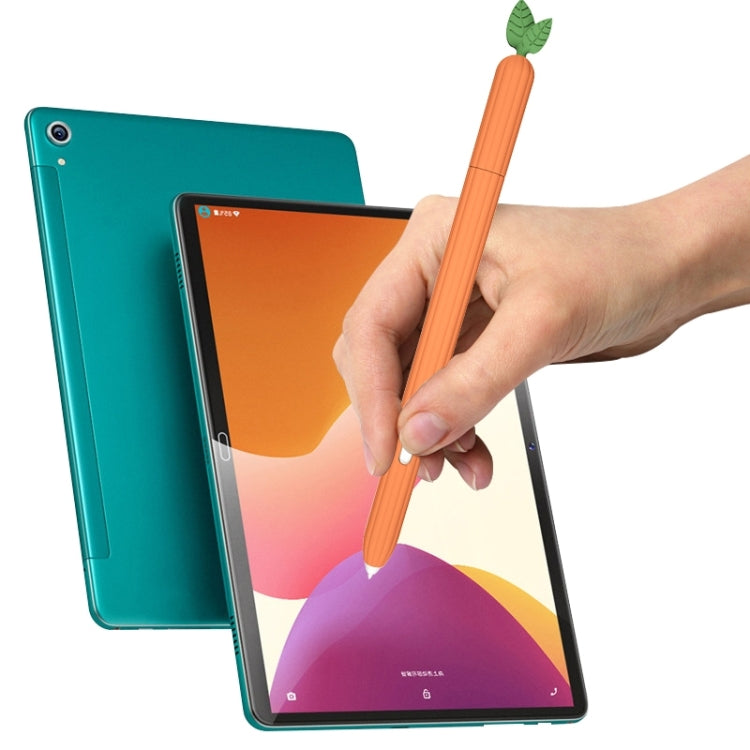 Carrot-shaped silicone stylus protective case, orange with green leaf, held in hand