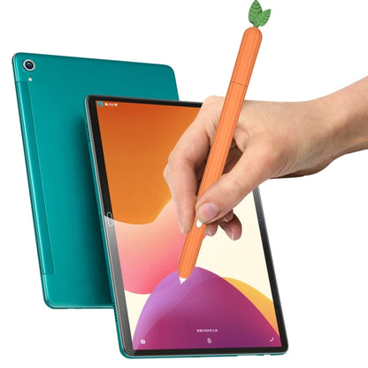 Carrot-shaped silicone stylus protective case, orange with green leaf, held in hand