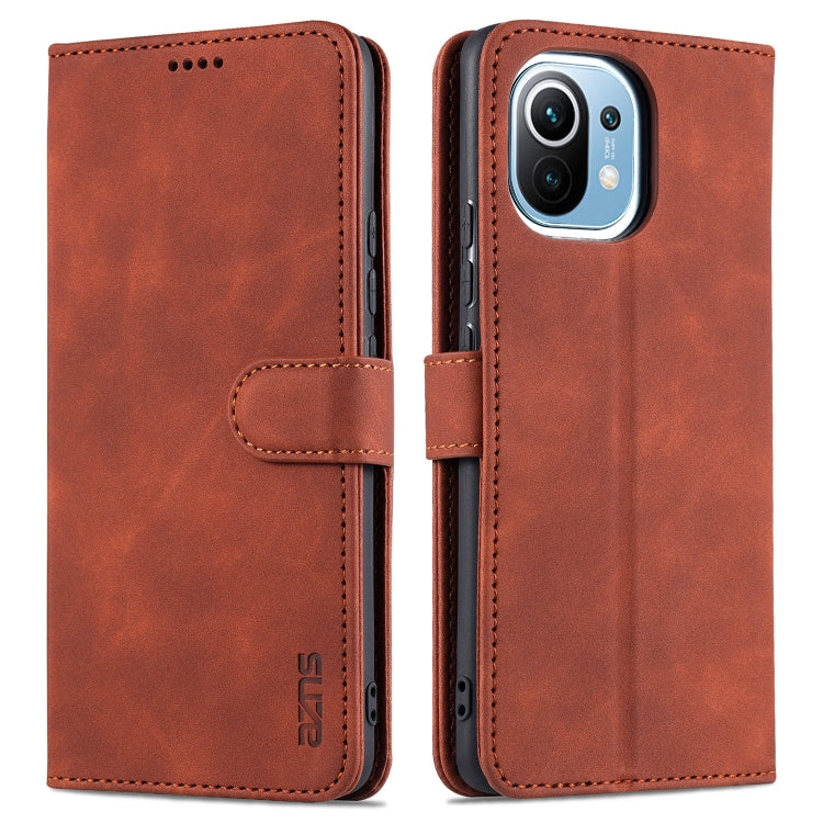 Brown flip leather phone case with side card holder and stitched magnetic strap.