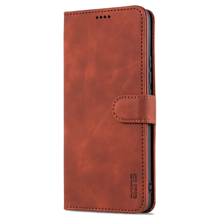 Brown flip leather phone case with card slot tab and stitched flip strap.