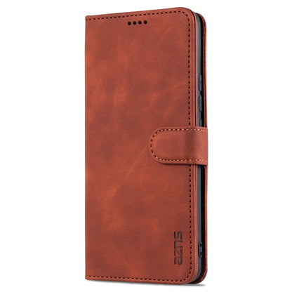 Brown flip leather phone case with card slot tab and stitched flip strap.