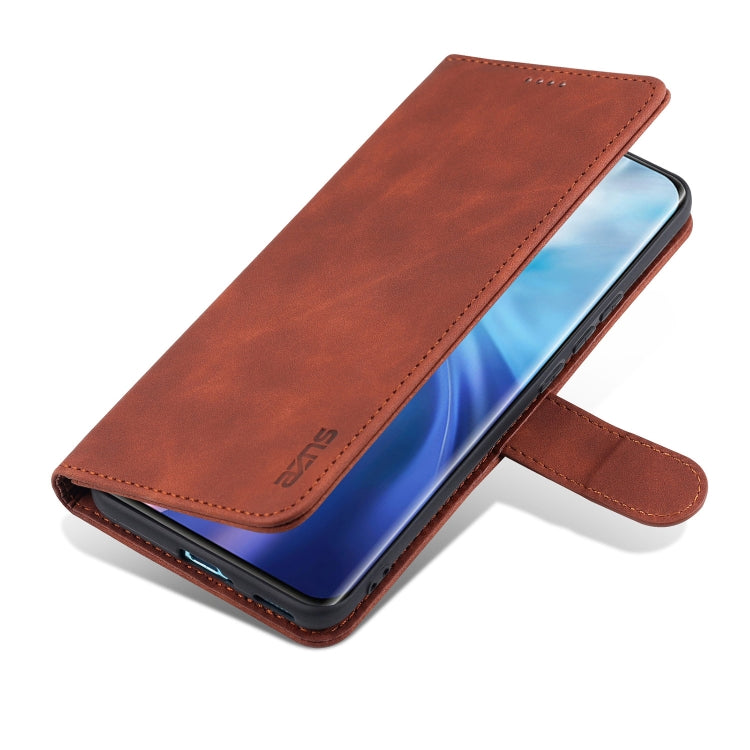 Brown flip leather phone case with wallet-style cover and card slot tab.