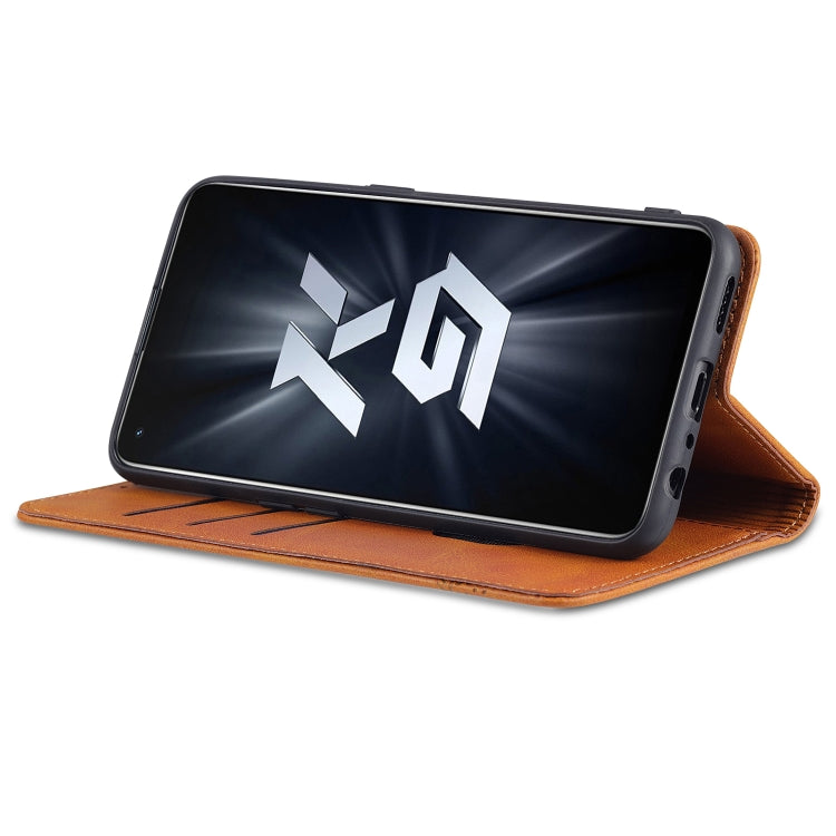 Tan leather flip phone case with phone standing on the folio
