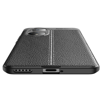 Shockproof TPU phone case, black litchi-texture, side buttons and speaker ports visible.