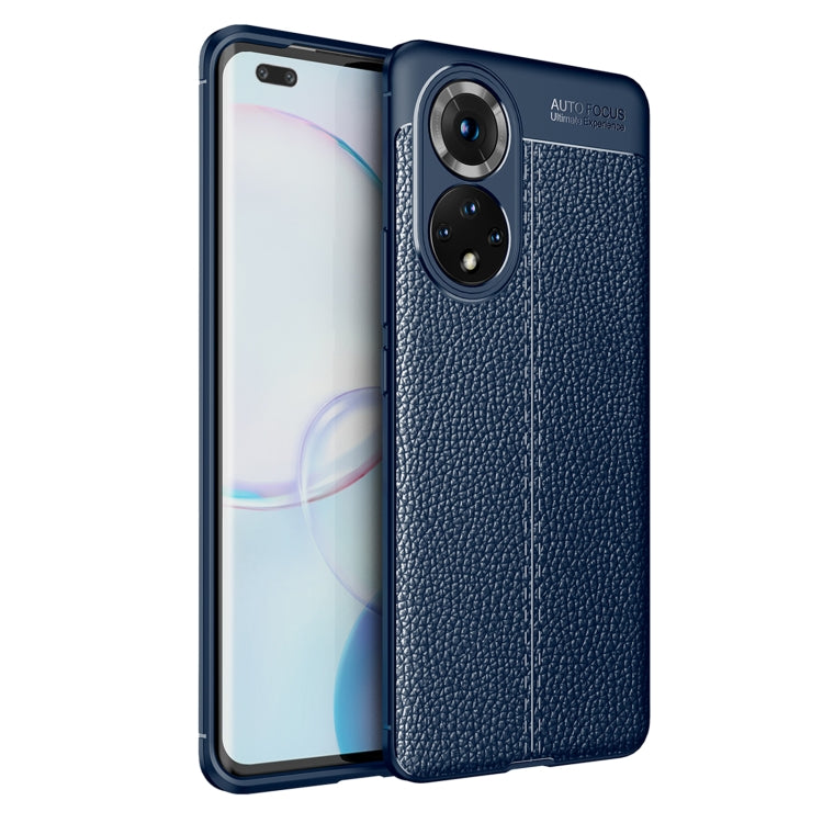 Shockproof TPU phone case with litchi-texture finish, navy blue, raised camera cutouts.