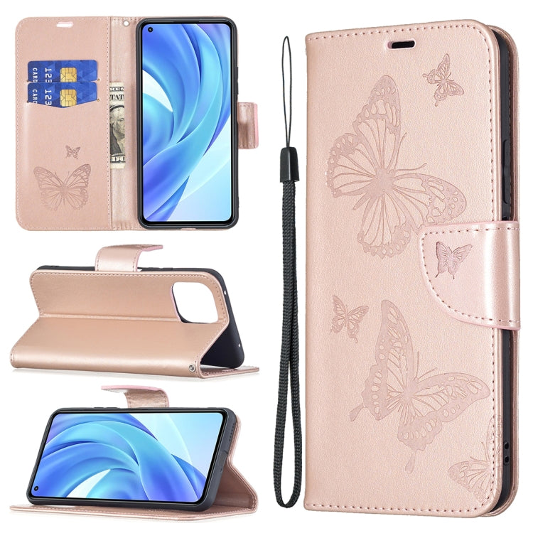 Light rose PU leather phone wallet case with butterfly embossing, card slot, and lanyard
